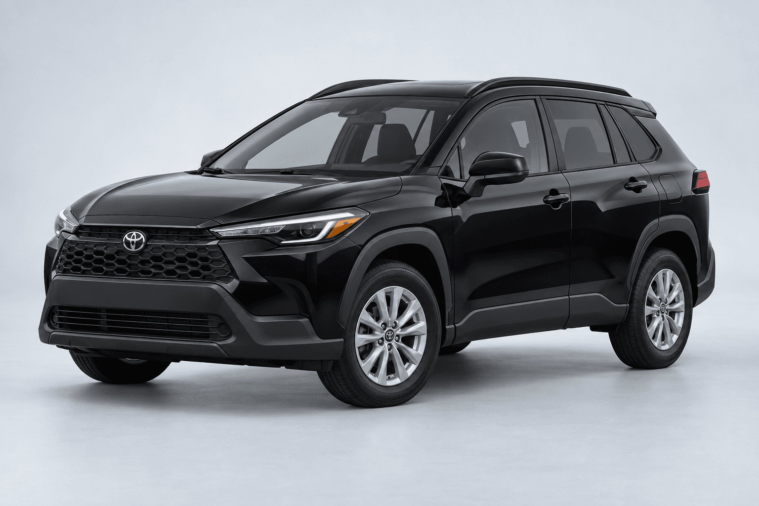 2026 Toyota Corolla Cross LE in Midnight Black Metallic, three-quarter studio view